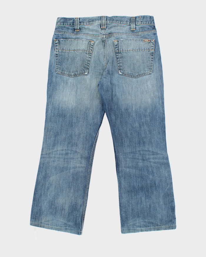 Vintage 90's Carhartt Baggy Medium Wash Denim Jeans - W34 L27