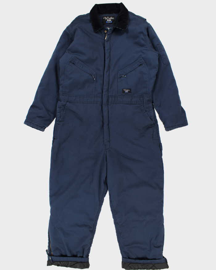 Blue coveralls near shop me