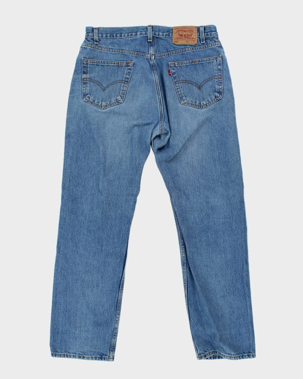 Vintage Levi's 505 Relaxed Fit Medium Wash Jeans - W34 L30 – Rokit
