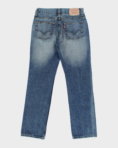 Vintage Levi's 522 Slim Medium Wash Jeans - W28 L28