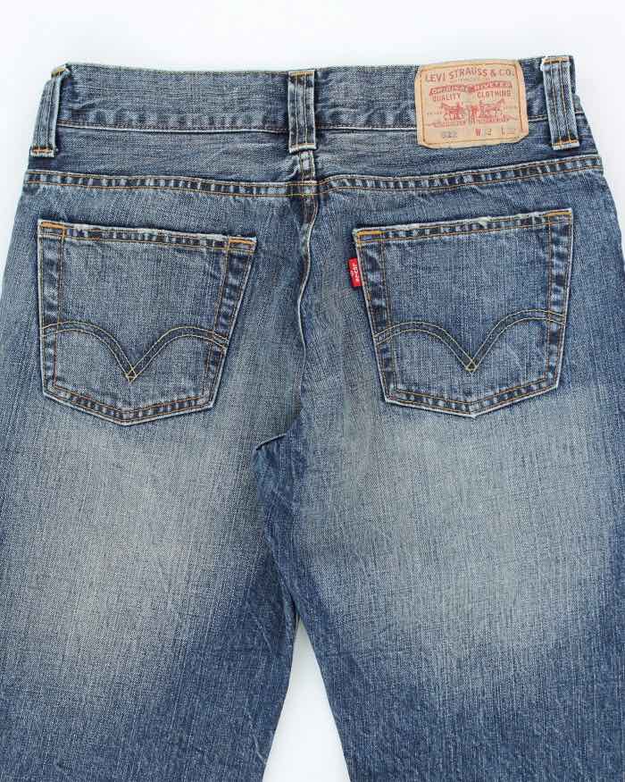 Vintage Levi's 522 Slim Medium Wash Jeans - W28 L28