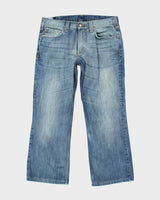 Vintage 90's Carhartt Baggy Medium Wash Denim Jeans - W34 L27