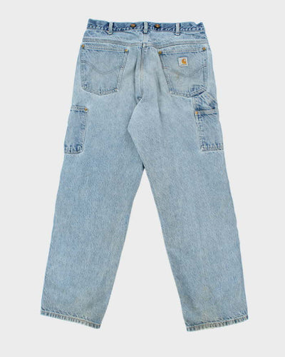Vintage Carhartt Faded Light Wash Single Knee Carpenter Jeans - W30 L29