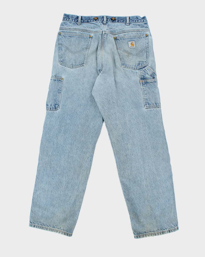 Vintage Carhartt Faded Light Wash Single Knee Carpenter Jeans - W30 L29