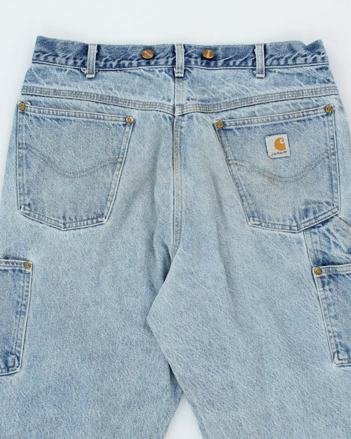 Vintage Carhartt Faded Light Wash Single Knee Carpenter Jeans - W30 L29