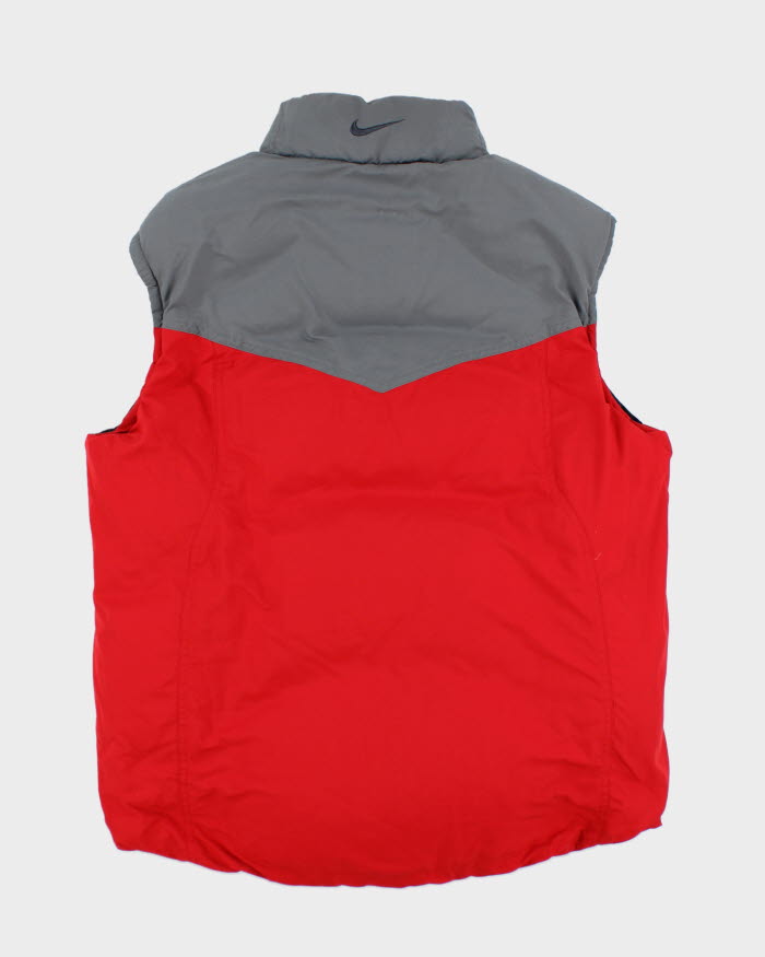 Chaleco reversible Nike vintage de los años 2000 con relleno de plumón L