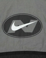 Vintage 1990s Nike Spell-Out Block Shell Windbreaker Jacket - L