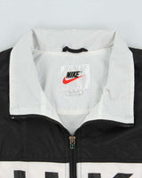 Vintage 1990s Nike Spell Out Windbreaker - XL