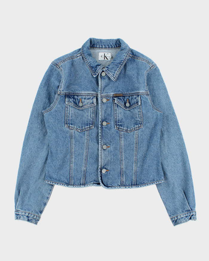 Vintage 1990s Calvin Klein Women's Medium Wash Cropped Denim Jacket - L