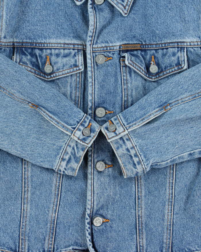 Vintage 1990s Calvin Klein Women's Medium Wash Cropped Denim Jacket - L