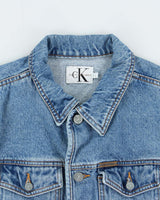 Vintage 1990s Calvin Klein Women's Medium Wash Cropped Denim Jacket - L