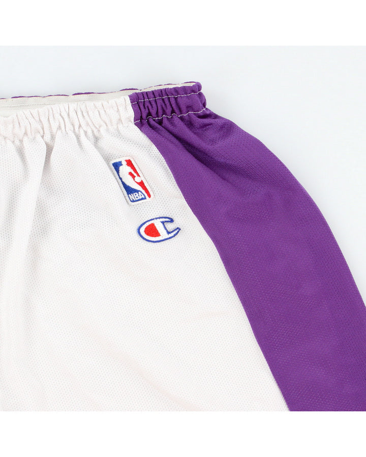 Vintage Toronto Raptors x Champion Basketball Shorts - L – Rokit