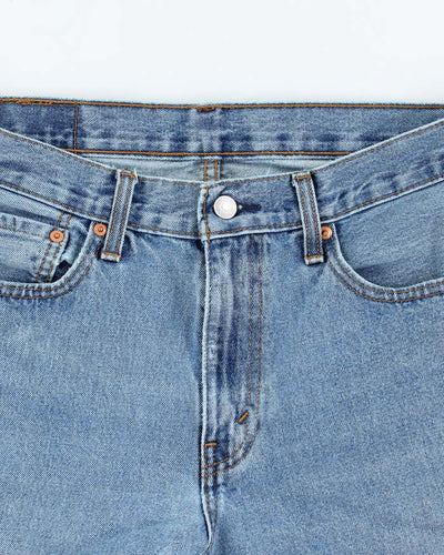 Vintage Levi's Cut Off Raw Hem Medium Wash Denim Shorts - W30 L11