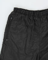 Vintage 1990s Umbro Classic Diamond Shell Relaxed Fit Zip Cuff Tracksuit Bottoms - L