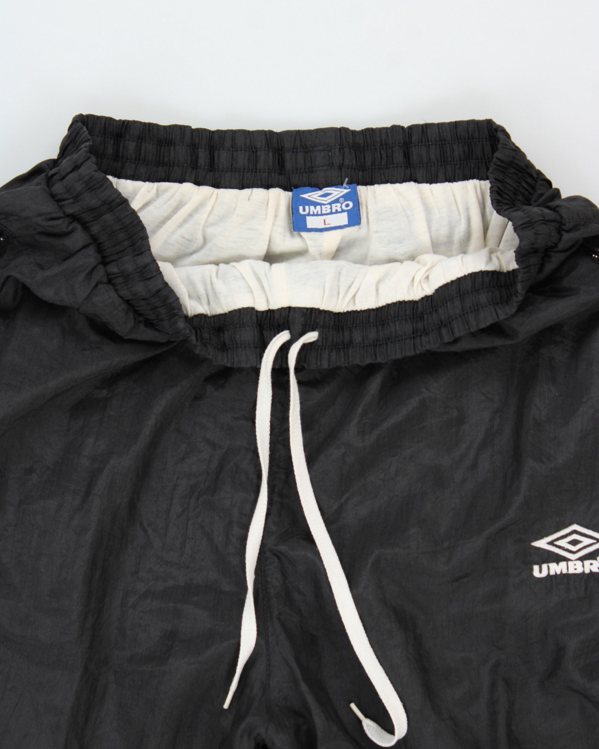 Vintage 1990s Umbro Classic Diamond Shell Relaxed Fit Zip Cuff Tracksuit Bottoms - L