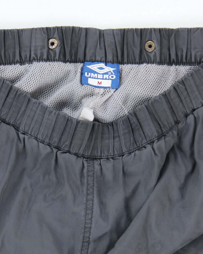 Vintage 90's Umbro Faded Leg Popper Track Suit Bottoms - M