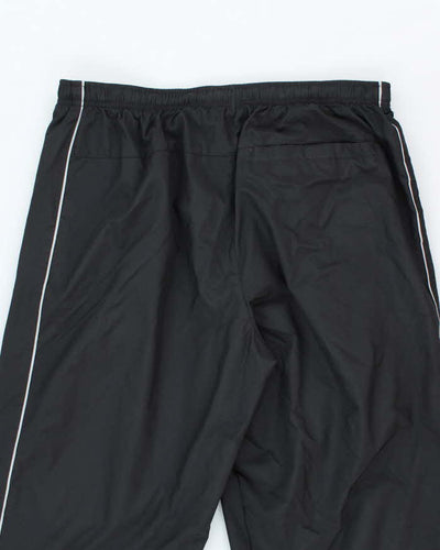 Vintage Y2K Nike Open Cuffs Small Swoosh Tracksuit Bottoms - L