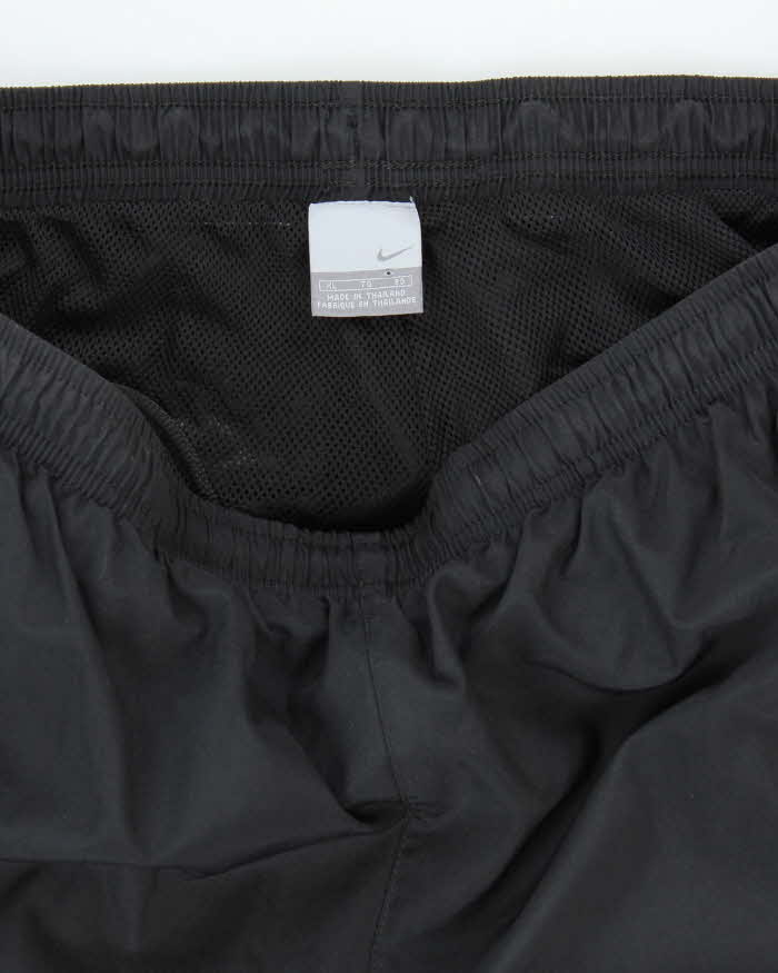 Vintage Y2K Nike Open Cuffs Small Swoosh Tracksuit Bottoms - L