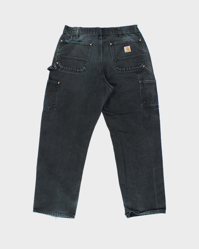 Vintage Carhartt B01 BLK Duck Canvas Double Front Loose Fit Made In USA Distressed Carpenter Trousers - W33 L30