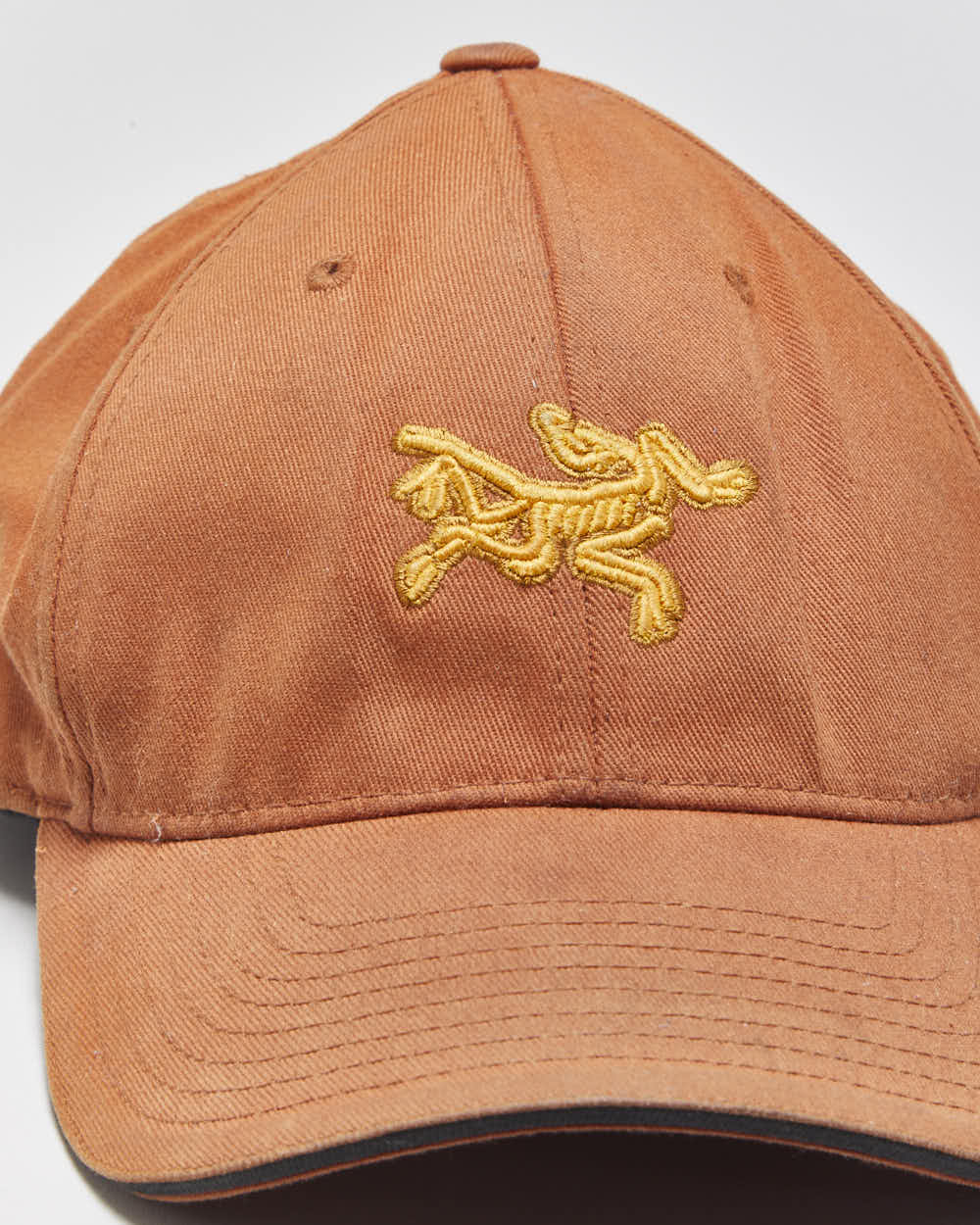 Vintage Arc'teryx Burnt Orange Embroidered Bird FlexFit Baseball Cap - OS
