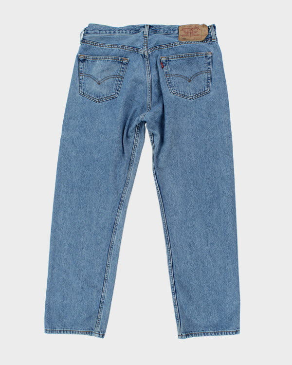 Vintage Levi's 501 Medium Wash Jeans - W34 L30 – Rokit