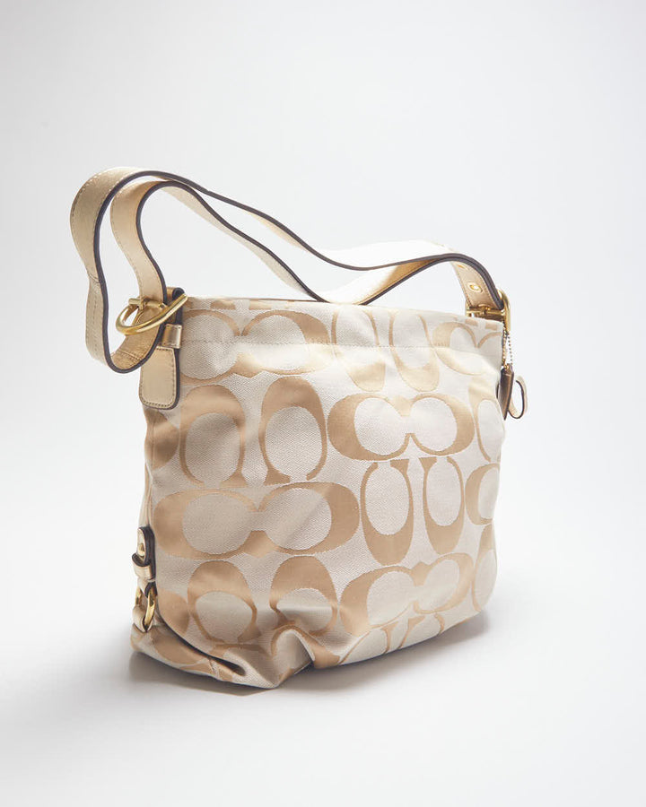 Coach Gold Monogram Handbag