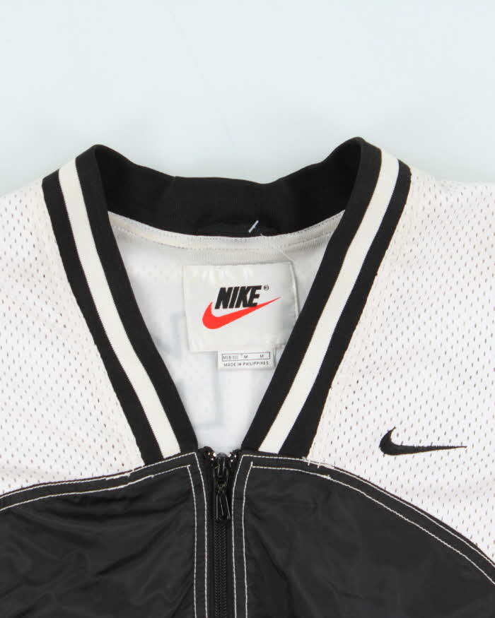 Vintage Women's 1990s Nike Basketball Spell Out Windbreaker Jacket - M