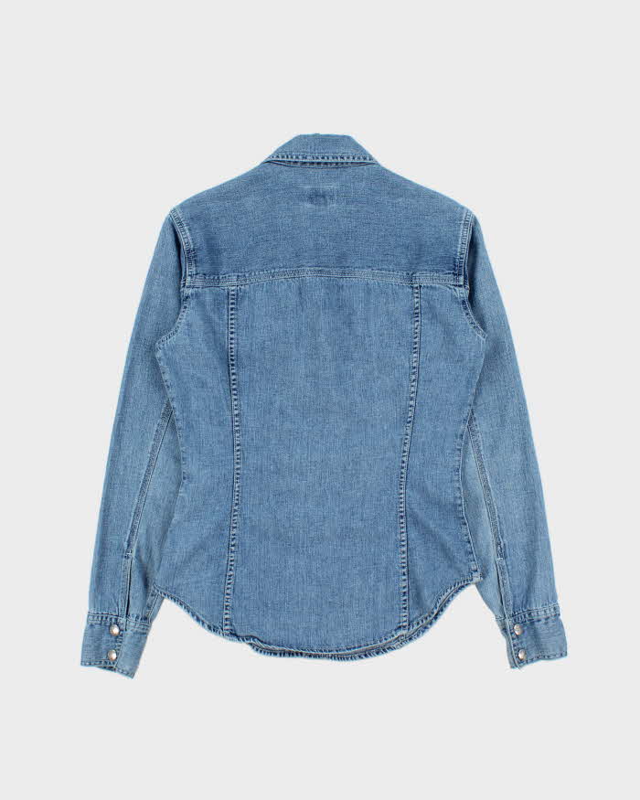Vintage 1990s Calvin Klein Women's Light Wash Denim Snap Button Long Sleeve Shirt - S