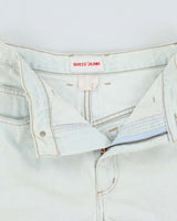 Vintage 1990s Guess Women's High Waisted Light Wash Denim Mini Shorts - W26