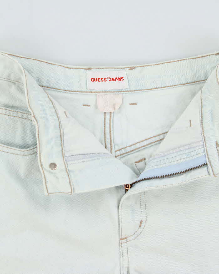 Vintage 1990s Guess Women's High Waisted Light Wash Denim Mini Shorts - W26