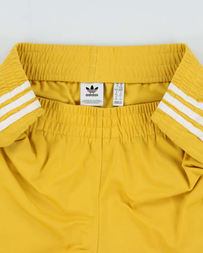 Vintage Adidas Originals Women's Mustard 3-Stripe Firebird Shorts - M