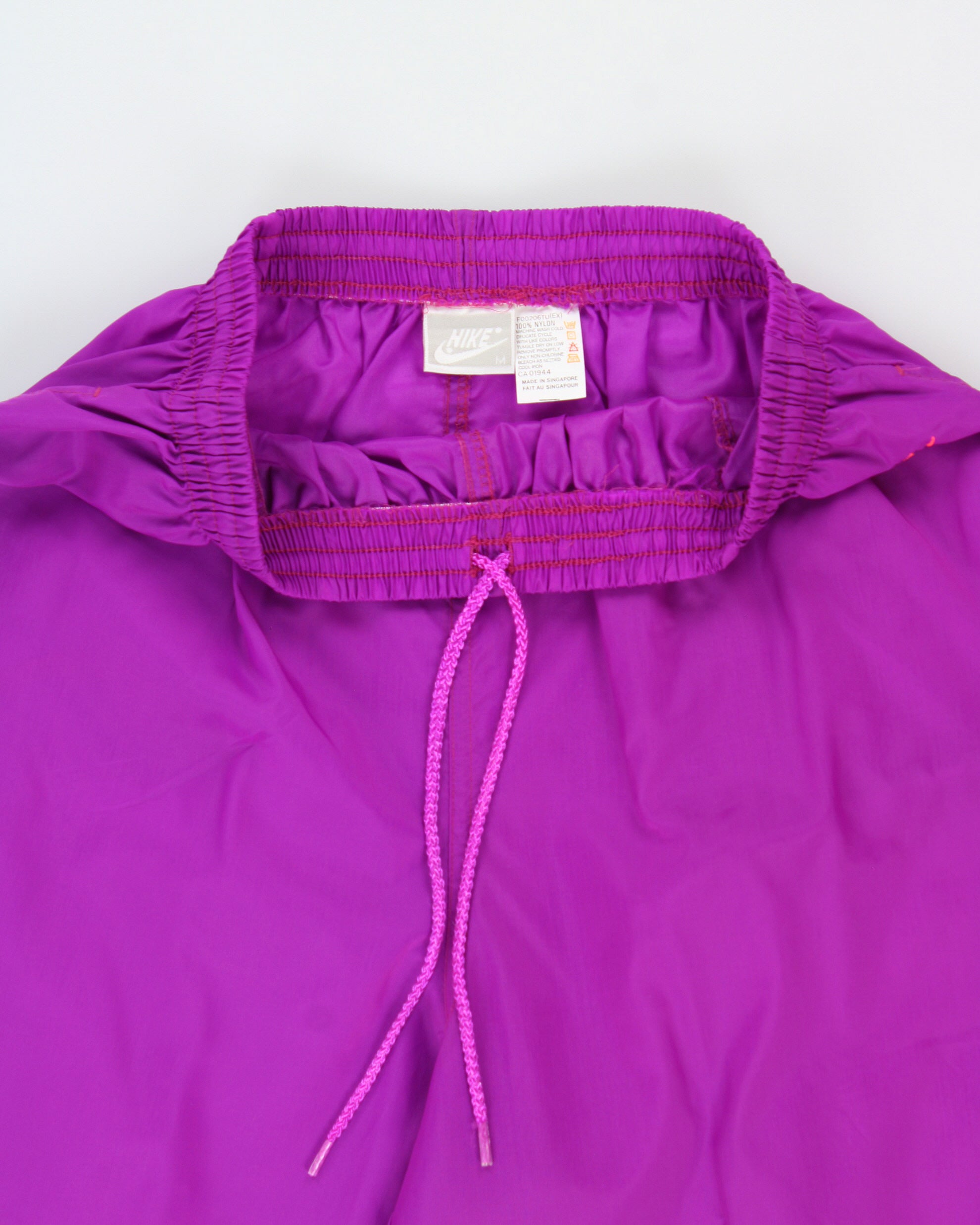 Vintage 1992 Nike Women's Relaxed Fit Elastic Cuff Shell Tracksuit Bottoms - M