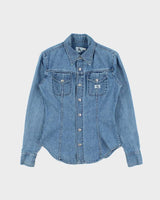 Vintage 1990s Calvin Klein Women's Light Wash Denim Snap Button Long Sleeve Shirt - S