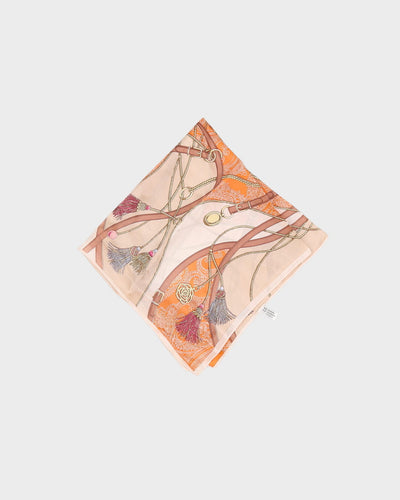 Orange and beige patterned silk scarf